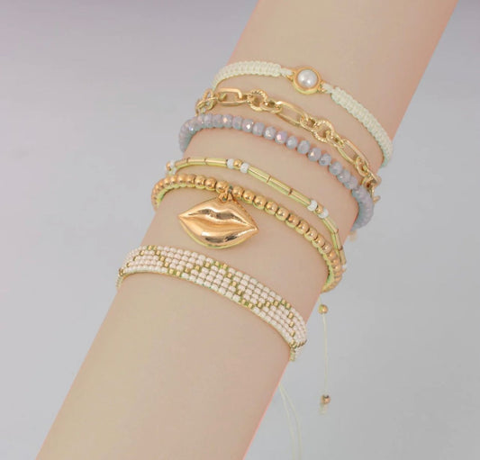 Set Pulsera Tejida + Aretes